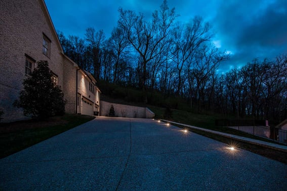 Driveway at night with flush mounted indicator lighting