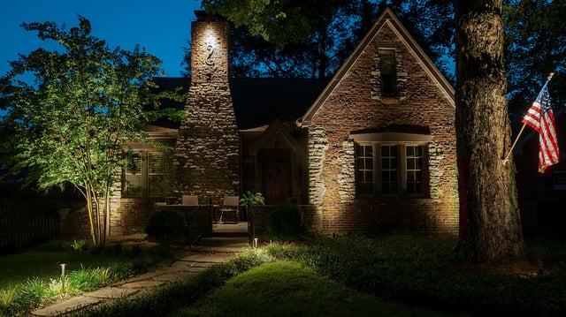 up-lighting-brick-gable-grazing-effect.jpg Up lighting on brick facade of home with up lights