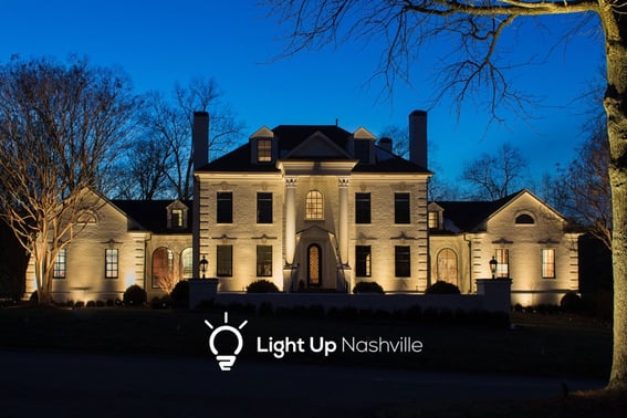 Architectural lighting to increase curb appeal on home in Brentwood with columns and features