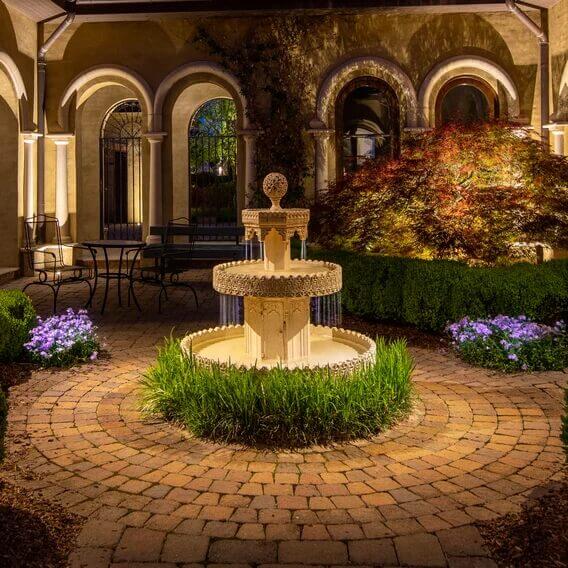 Landscape Architects and lighting designers - backyard fountain 