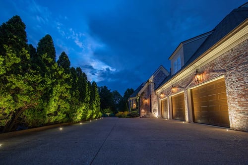 well lights in concrete lighting house and garage